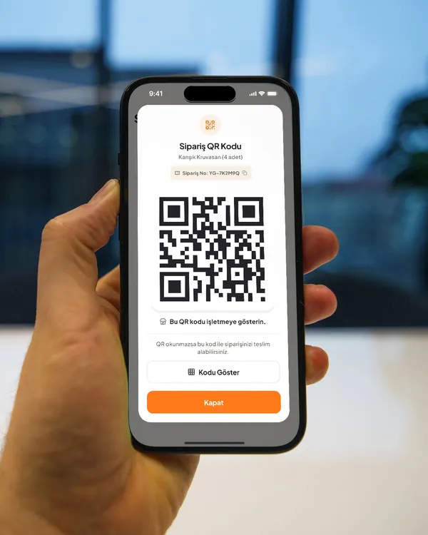 Elde tutulan iPhone’da sipariş QR kodu